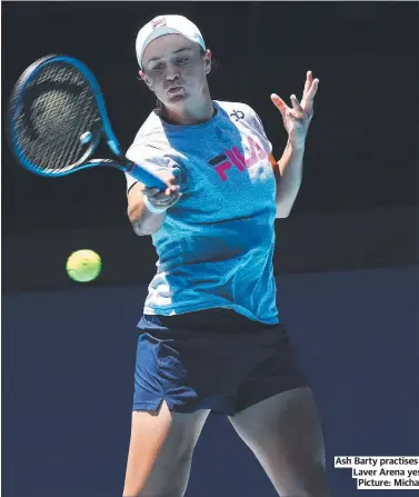  ?? ?? Ash Barty practises on Rod Laver Arena yesterday. Picture: Michael Klein