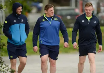  ??  ?? Furlong (centre) with Leinster team-mates Robbie Henshaw and Dan Leavy.