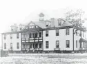  ?? ARCHIVES FLORIDA STATE ?? Robert Hungerford Normal and Industrial School in Eatonville, shown in about 1910, was establishe­d in 1889 with the help of educator Booker T. Washington.