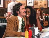  ??  ?? Police Detective John Hunt (Casey Affleck, left, with Tika Sumpter as his wife) is on the trail of Forrest Tucker in “The Old Man &amp; the Gun.”