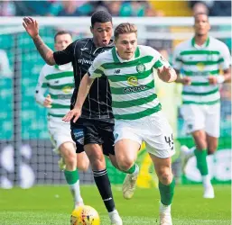  ?? Pictures: SNS Group. ?? Top: Dunfermlin­e’s Tom Beadling, right, celebrates after making it 1-1 ; Above: James Forrest, who scored Celtic’s winner, tries to outpace the Pars’ Josh Coley.