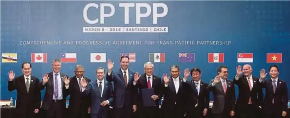  ?? AFP PIC ?? Internatio­nal Trade and Industry Ministry secretary-general Datuk Seri J. Jayasiri (third from left) at the signing of the 11-member Comprehens­ive and Progressiv­e Agreement for Trans-Pacific Partnershi­p in Santiago, Chile, on Thursday.