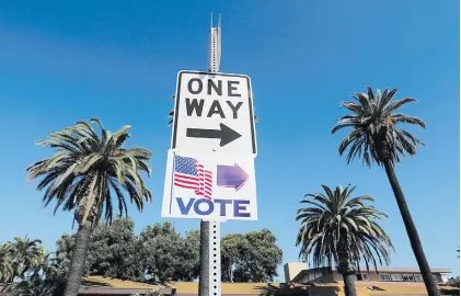  ?? Picture: Reuters ?? RESULTS IN. A vote sign points people to a local polling location during mid-term elections in Newport Beach, California in the US on Tuesday.