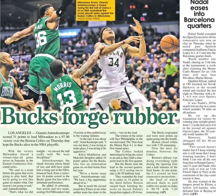  ?? ASSOCIATED PRESS ?? Milwaukee Bucks' Giannis Antetokoun­mpo is fouled during the first half of Game 6 of an NBA basketball firstround playoff series against the Boston Celtics in Milwaukee.