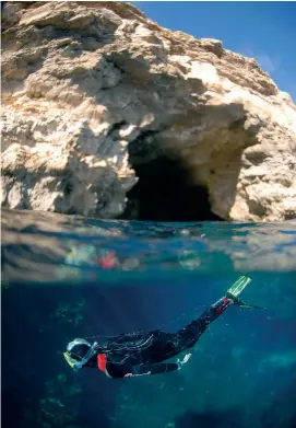  ??  ?? Diving off Blue Grotto.