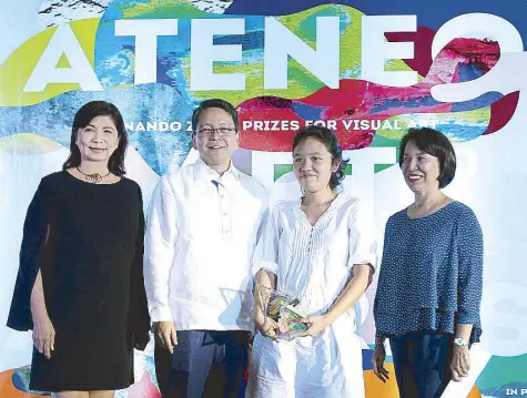  ?? Photos by JUN MENDOZA ?? Philippine STAR Lifestyle editor Millet Mananquil, Ateneo De Manila University president Fr. Jett Villarin, S.J., and Kalaw-Ledesma Foundation president Ada Ledesma-Mabilangan flank Paula Acuin, winner of the Purita Kalaw-Ledesma Prize for Art Criticism.