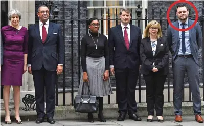  ??  ?? Rising star: Ben Bradley, circled, with Mrs May and his fellow party vice-chairmen last week