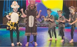  ??  ?? Scarlett Cutler (Timon), Lily Jones (Pumbaa), Madeline Weyling (Banzai), Poppy Donnelly (Shenzi) and Leila Hewitt (Ed) on stage.