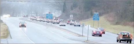  ?? Keith Bryant/The Weekly Vista ?? Southbound traffic on U.S. Highway 71 backed up to Sunset Drive on an overcast Monday morning.