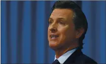  ?? THE ASSOCIATED PRESS ?? The question is whether Gov. Gavin Newsom’s follow-through on vaccinatio­n plans will work.