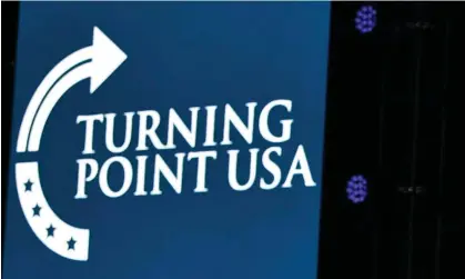  ?? Photograph: Nicholas Kamm/AFP/Getty Images ?? A Turning Point USA logo at a summit in Palm Beach, Florida, in 2019.