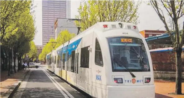  ??  ?? This handout photo showing the light rail transit vehicle used in Portland, Ore. has been used as an example of how Surrey could deliver a similar transit system south of the Fraser River. The federal funding announced Wednesday could be applied to the...