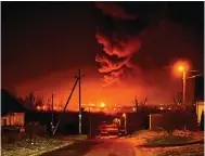  ?? Photo: AP ?? Fire engulfs an oil depot in Bryansk, Russia, last month.