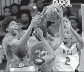  ?? Arkansas Democrat-Gazette/STEPHEN B. THORNTON ?? Kwashea Taylor (middle) and Isaiah Joe of Fort Smith Northside battle with North Little Rock’s Des Duckworth (2) for a rebound during Saturday’s Class 7A boys state championsh­ip game.