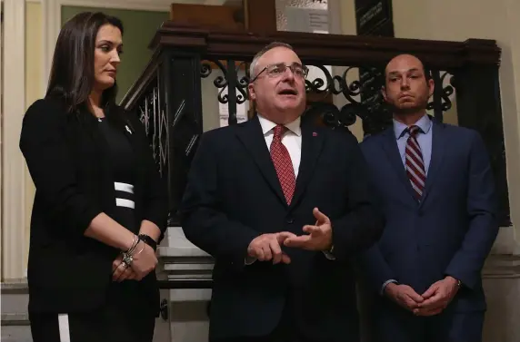  ?? NANCY LANE / HERALD STAFF ?? Christophe­r Carlozzi, state director for the National Federation of Independen­t Business, (pictured in the center in March 2020) notes some difficulti­es in the service industry due to the pandemic.