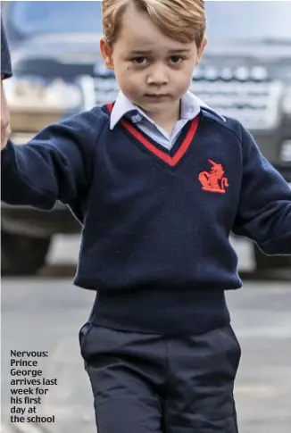  ??  ?? Nervous: Prince George arrives last week for his first day at the school