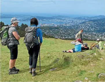  ??  ?? Taking in the view from Mt Kaukau.