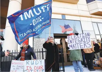  ?? REY DEL RIO GETTY IMAGES ?? The Michigan Supreme Court on Wednesday rejected a request by Trump supporters to take control of ballots and ballot boxes from the Nov. 3 election.