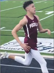  ?? Submitted Photo ?? Pocola’s Garrett Scott hits a stretch of the 800-meter run in the Foyil Invitation­al on Friday.