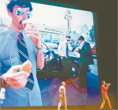  ??  ?? A still from
Beastie Boys
Story, with Adam “AdRock” Horovitz (centre) and Michael “Mike D” Diamond on stage.