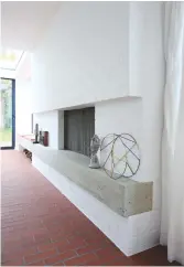  ??  ?? Top, The kitchen and dining area maximises light and connection To The outdoors above, The painted brick fireplace and Terracotta flooring add a sense of warmth