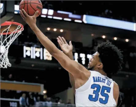  ?? KEITH SRAKOCIC — THE ASSOCIATED PRESS ?? Duke’s Marvin Bagley III (35) shoots against Rhode Island during the first half of a second-round game in the NCAA men’s college basketball tournament in Pittsburgh. Duke takes on Syracuse in a regional semifinal on Friday.