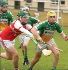  ??  ?? Joshua Doyle of Duffry Rovers tries to get away from Dylan Brady.