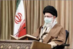  ?? AP photo ?? Supreme Leader Ayatollah Ali Khamenei wearing a protective face mask, attends a meeting in Tehran, Iran on Wednesday. Khamenei said Wednesday that the offers being made at the Vienna talks over his country’s tattered nuclear deal “are not worth looking at.”