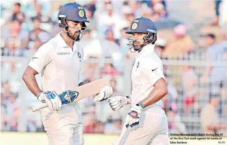  ?? PIC/PTI ?? Shikhar Dhawan and L Rahul during Day IV of the first Test math against Sri Lanka at Eden Gardens