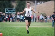  ?? DOUGLAS ZIMMERMAN — SPECIAL TO THE MARIN INDEPENDEN­T JOURNAL ?? Redwood High’s Hudson Grace crosses the finish line for the boys MCAL cross country meet at Indian Valley College in Novato in November of 2019. Grace has been fundraisin­g during the pandemic to provide N95masks for teachers at Redwood.