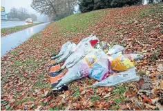  ??  ?? Tributes left to Kevin Swan on Macalpine Road.