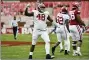  ?? MICHAEL WOODS — THE ASSOCIATED PRESS ?? Alabama defensive lineman Phidarian Mathis (48) celebrates after sacking Arkansas quarterbac­k Feleipe Franks during the first half of an NCAA college football game Saturday, Dec. 12, 2020, in Fayettevil­le, Ark.