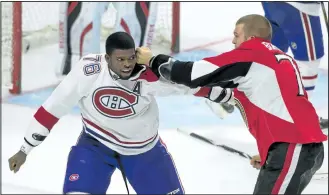  ?? MARC DESROSIERS/ REUTERS FILES ?? In a scene that was expected to be be reprised in Game 2 on Friday night, Montreal’s P. K. Subban and Ottawa’s Mark Borowiecki square off in a game during the regular season at the Canadian Tire Centre.