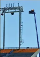  ?? HAMILTON SPECTATOR FILE PHOTO ?? Workers recently removed some speakers at Tim Hortons Field after one fell.