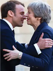  ??  ?? Talks: Mr Macron greets Mrs May yesterday