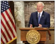  ?? (Arkansas Democrat-Gazette/Thomas Metthe) ?? Gov. Asa Hutchinson announces merit-based pay raises for state employees during his weekly media briefing Tuesday at the state Capitol in Little Rock. More photos at arkansason­line.com/69gov/.