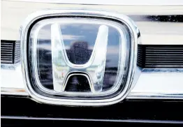  ?? AP ?? The Honda company logo is shown outside a Honda dealership on Sunday, September 12, 2021, in Highlands Ranch, Colorado.