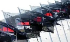  ?? — Reuters ?? GSMA flags fly at the Mobile World Congress in Barcelona.