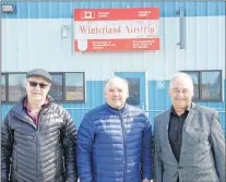  ?? COLIN FARRELL/ THE SOUTHERN GAZETTE ?? Eugene Nappard (left), Sam Synard and Pat White took a look around the Winterland airstrip on Tuesday following a presentati­on to the town by White.