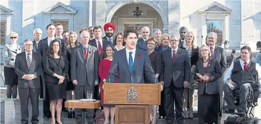  ?? FRED CHARTRAND THE CANADIAN PRESS FILE PHOTO ?? Prime Minister Justin Trudeau with his cabinet in November 2015. It’s tough to tell if SNC-Lavalin has killed his re-election chances, Susan Delacourt writes.