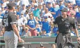  ?? | GETTY IMAGES ?? Plate umpire Lance Barksdale warns Sox reliever Chris Beck after Beck hit the Cubs’ Ian Happ with a pitch in the fifth inning Tuesday.