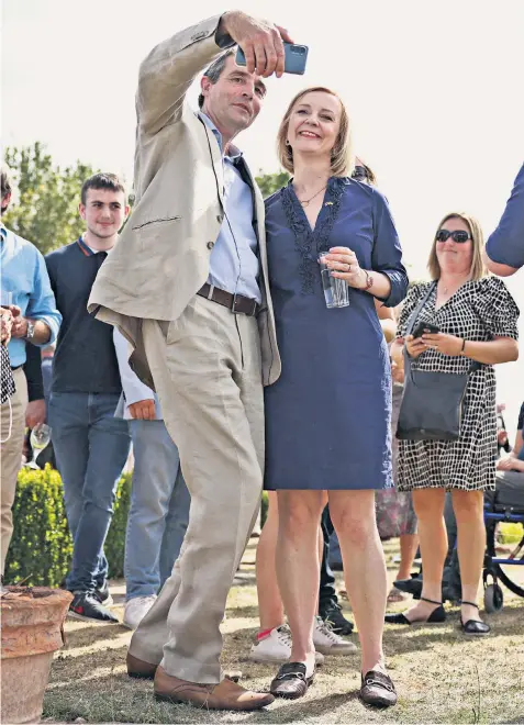  ?? ?? Liz Truss, attending a leadership campaign event in Marden, Kent, on Saturday, plans to create more ‘full-fat’ freeports and modern equivalent­s of Victorian workers’ settlement­s