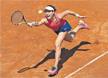  ??  ?? Reaching out: Johanna Konta at full stretch on her way to a 6-1, 3-6, 6-1 defeat by Venus Williams in Rome