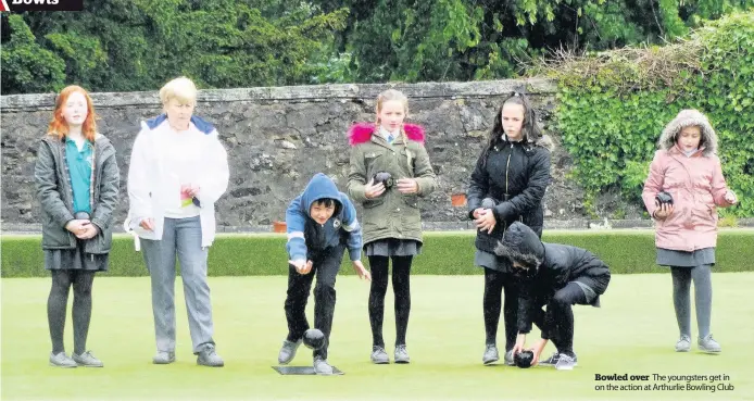  ??  ?? Bowled over The youngsters get in on the action at Arthurlie Bowling Club