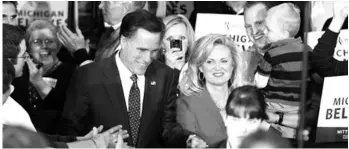  ??  ?? Republican presidenti­al candidate, former Massachuse­tts Gov. Mitt Romney and his wife Ann arrive at his election night party in Novi, Michigan. ASSOCIATED PRESS