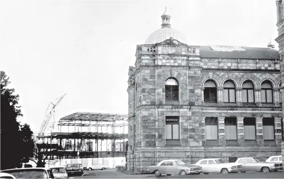  ??  ?? Constructi­on of the new museum building started in 1965. A sign for the old museum is visible in a window of the Legislativ­e Buildings.