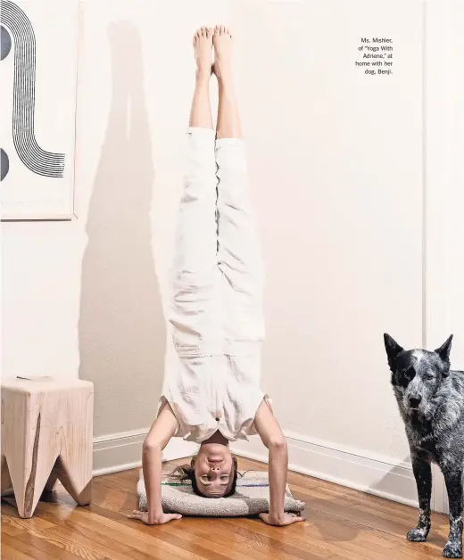  ?? ELI DURST FOR THE NEW YORK TIMES ?? Ms. Mishler, of “Yoga With Adriene,” at home with her dog, Benji.