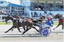  ?? PHOTO: RACE IMAGES ?? Ending strong . . . Eamon Maguire, driven by Natalie Rasmussen, sprints to the finish in the Ashburton Flying Stakes last month.