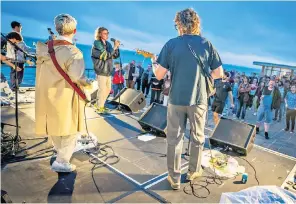  ??  ?? Seaside special: frontman Alex Rice and the band’s guitar players on the roof of the De La Warr Pavilion