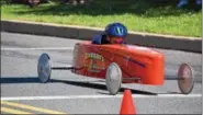  ?? MARIAN DENNIS – DIGITAL FIRST MEDIA ?? A racer crosses the finish line as one of many races comes to a close during the 24th annual Soapbox Derby in Pottstown.